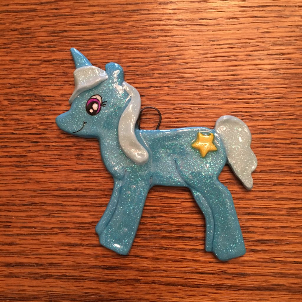 A blue pony with a star on its head.
