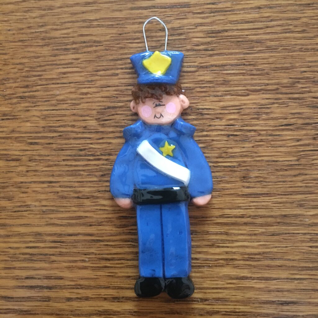 A toy policeman is on the table
