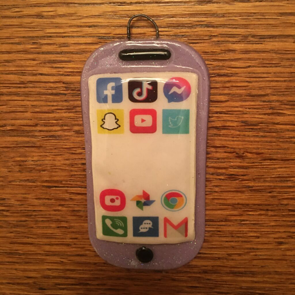 A cell phone with many different icons on it.